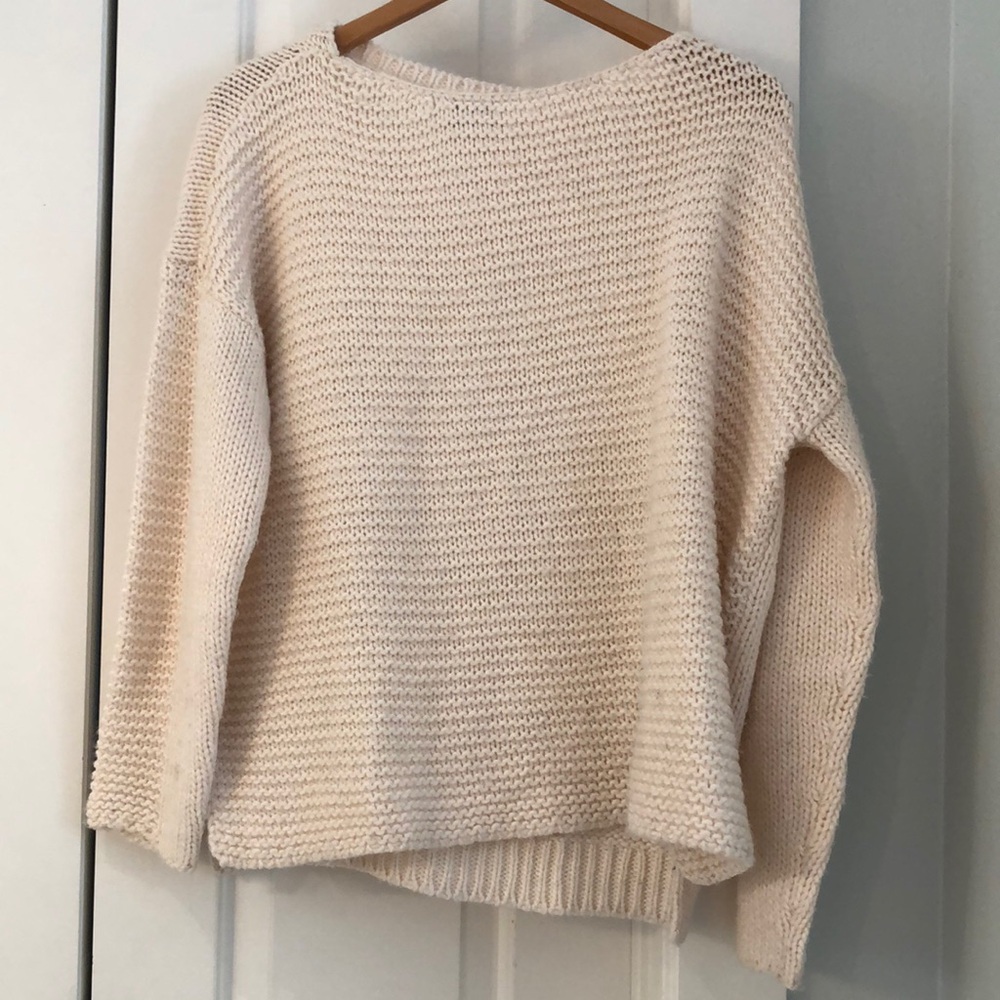Cream oversized crew neck sweater with chunky ribbed knit texture